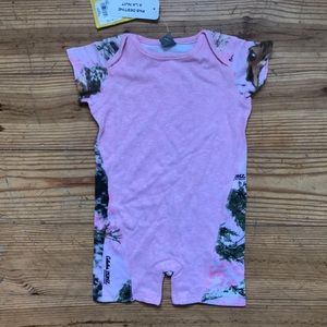 Girls size 6-12 mo pink camo playsuit